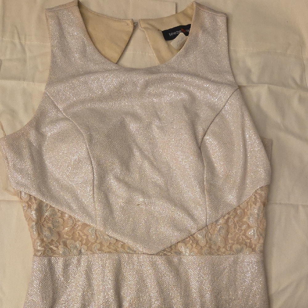 Elegant Beige Sleeveless Dress with Lace Detail